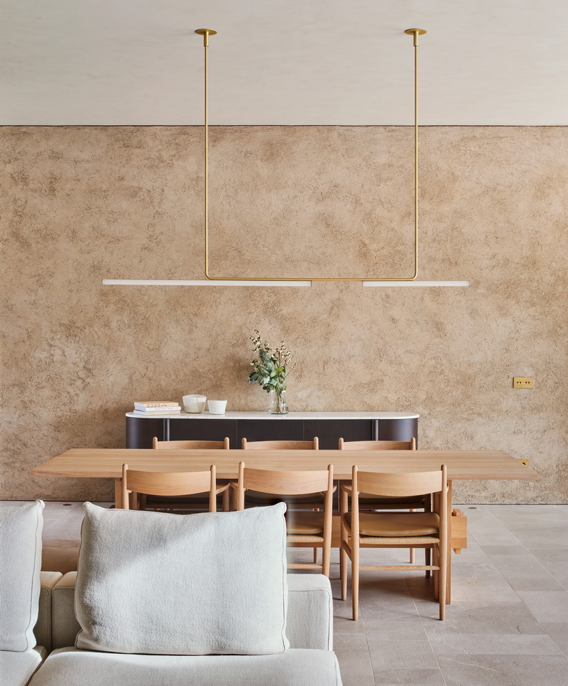 circular roof opening brings sunlight into casa óculo by OHLAB in palma - 6