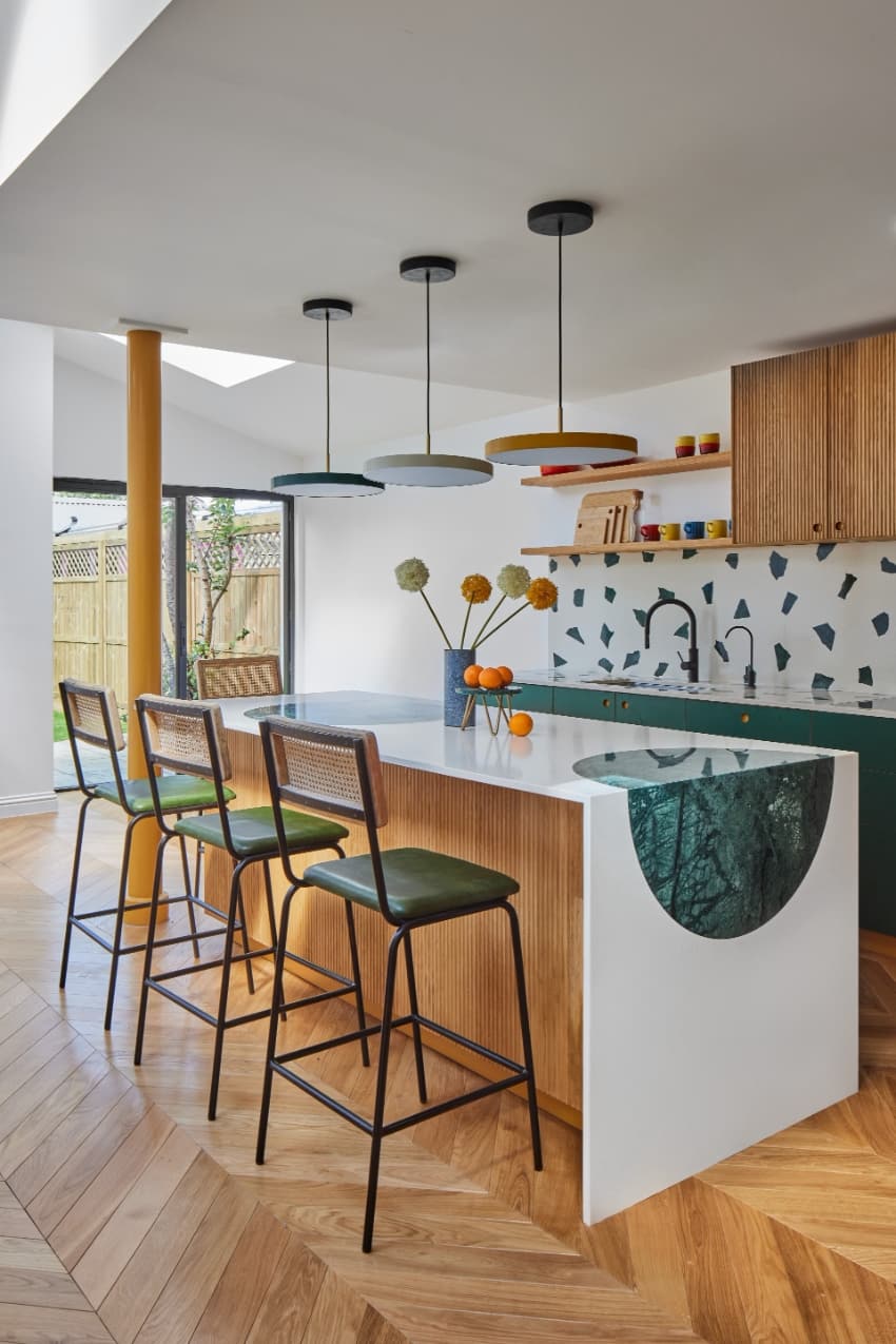 a series of square and circular skylights introduces geometric light casts within minty house