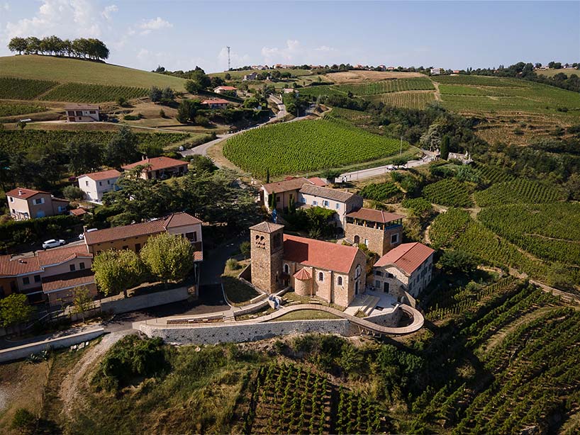 belvedere's wooden promenade by collection architectes floats above vineyards in france