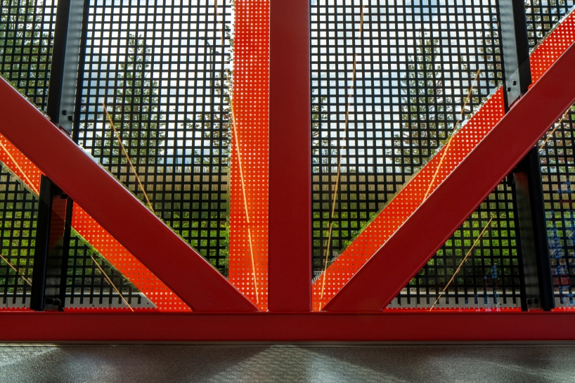 bright red steel frame outlines pritzker military archives center by jahn/ in wisconsin