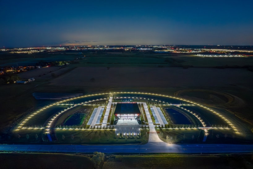 bright red steel frame outlines pritzker military archives center by jahn/ in wisconsin