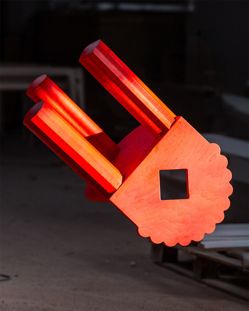 shape & shade's sculptural wooden chair reimagines traditional albanian shkam stool