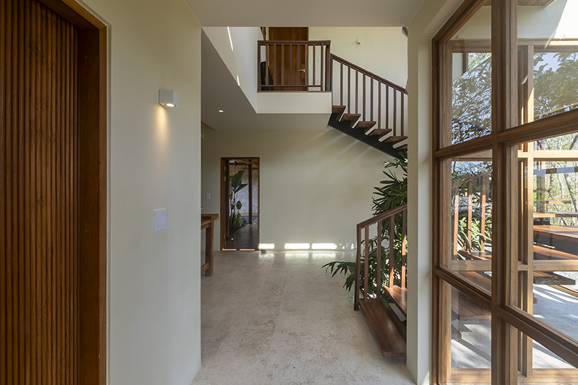recycled ocean-plastic tiles, timber, and stone shape tropical house on costa rica&rsquo;s coast - 7