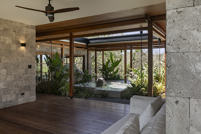 recycled ocean-plastic tiles, timber, and stone shape tropical house on costa rica&rsquo;s coast - 5
