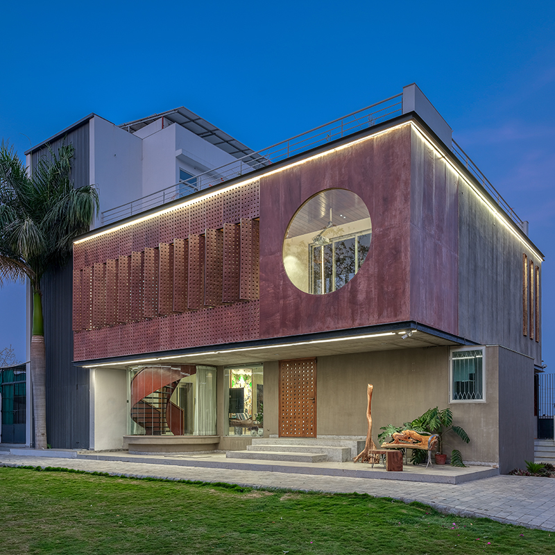 breathable stone facade by maanchitra enfolds family residence in rural india