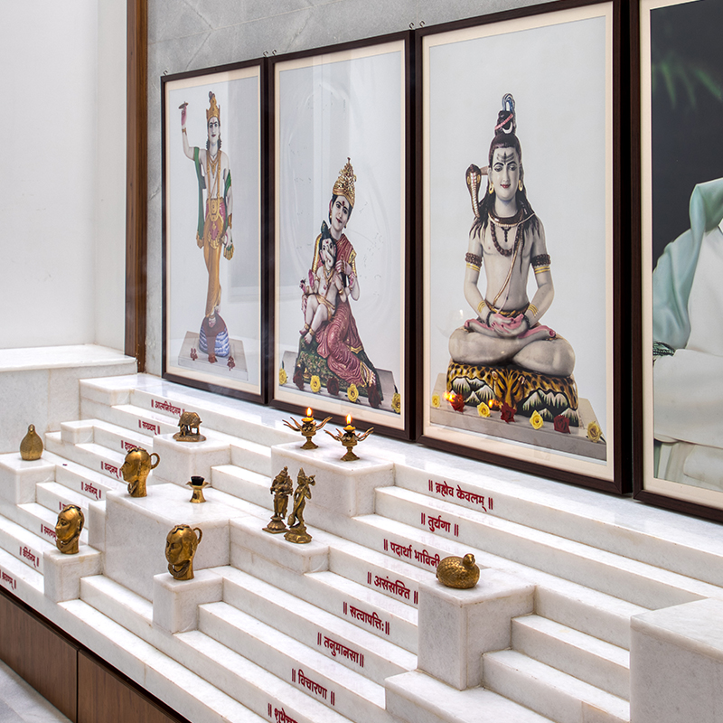 breathable stone facade by maanchitra enfolds family residence in rural india