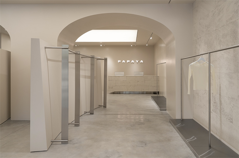 sculptural strategy between the walls redefines retail with papaya showroom 1