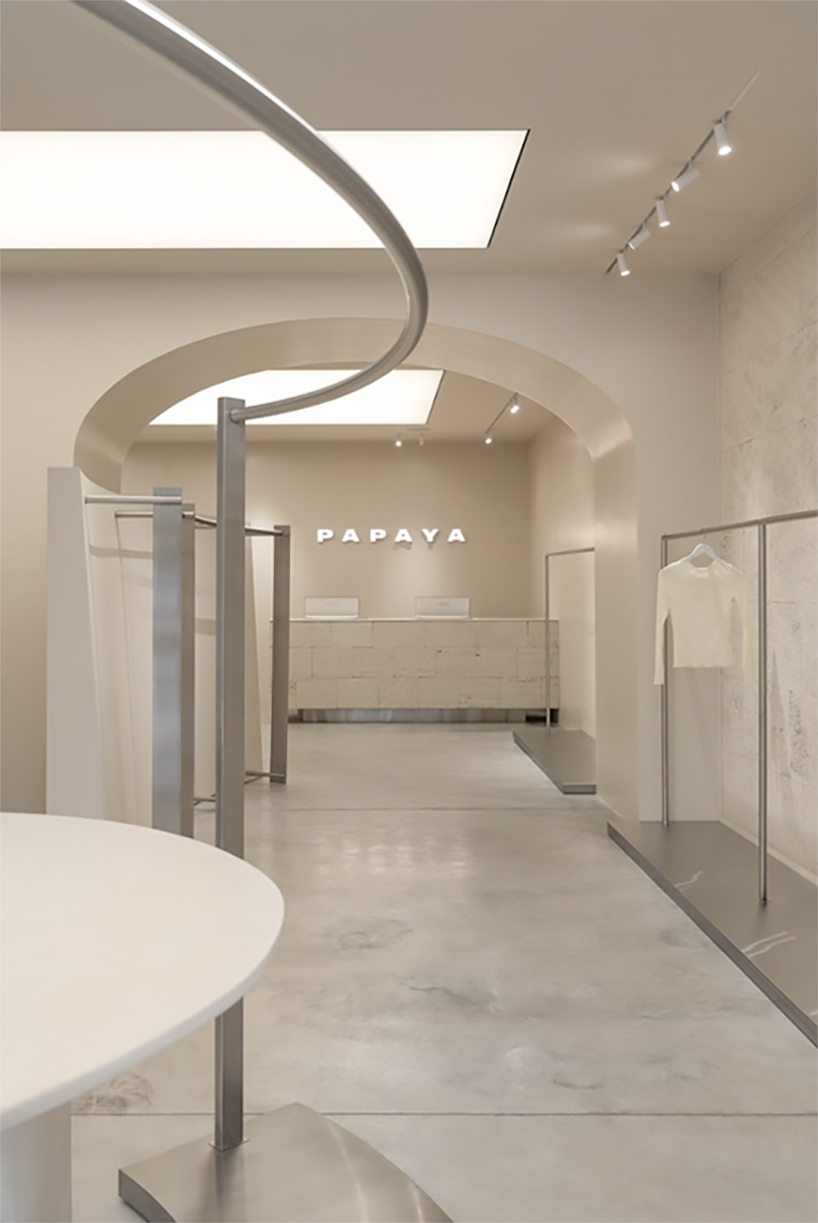 sculptural strategy between the walls redefines retail with papaya showroom 3