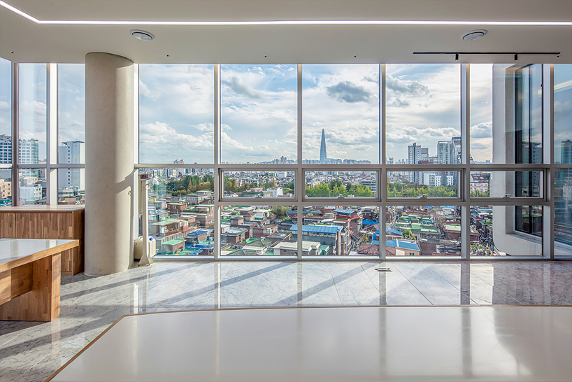 concrete and glass interplay upon kn global seoul headquarters' facade by zaira