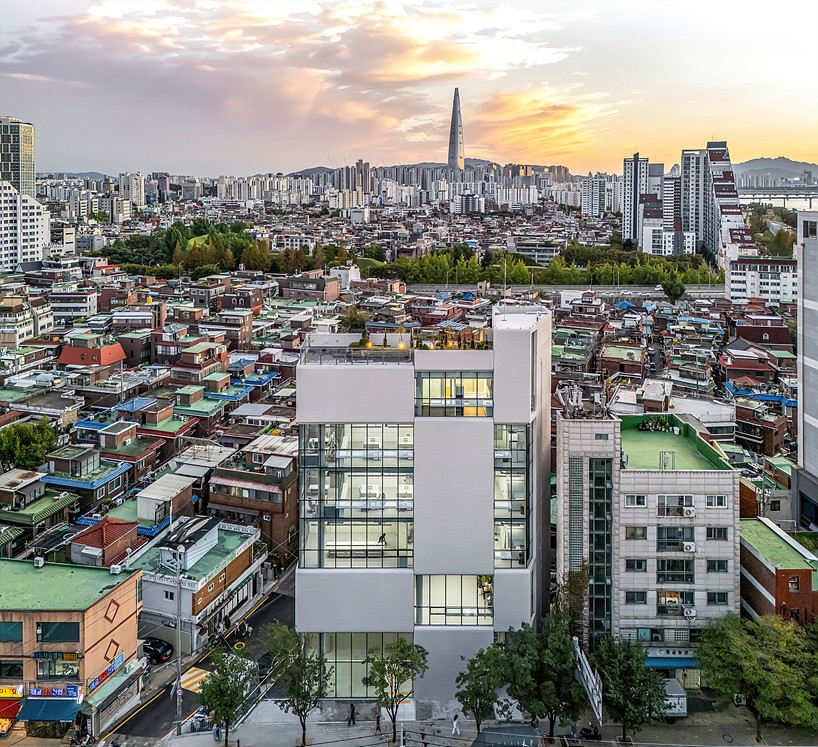 concrete and glass interplay upon kn global seoul headquarters' facade by zaira