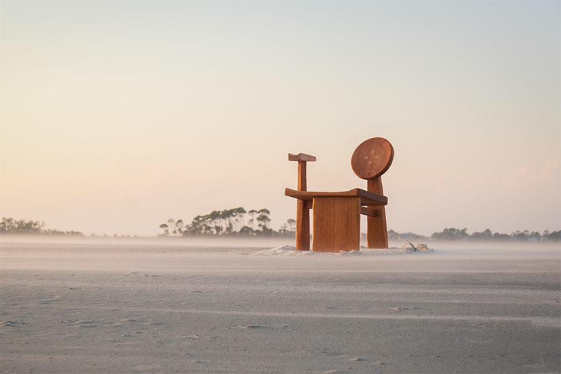 organic contours and asymmetric forms carved from cherry and maple wood define buttonback chair by nush wadia