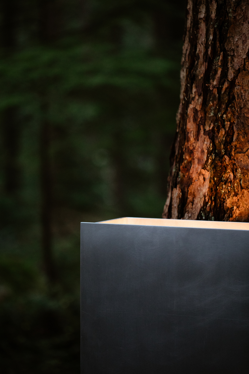 earth to people combines tree sap with salvaged wood in debut furniture collection