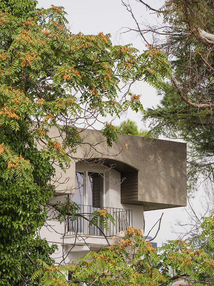 mome.estudio's zen housing units repurpose residential building on madrid's outskirts