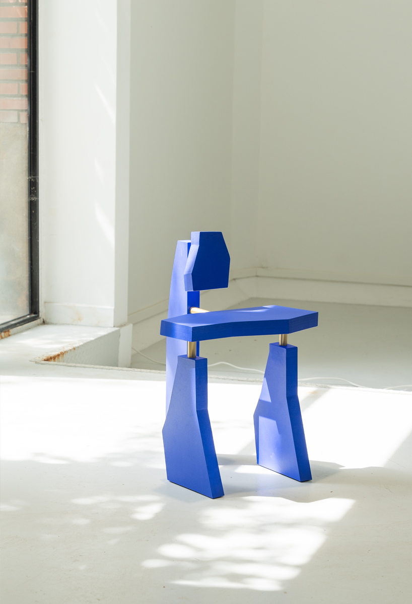 with jagged volumes painted cobalt blue, vincent decat's furniture reimagines ruins of delphi