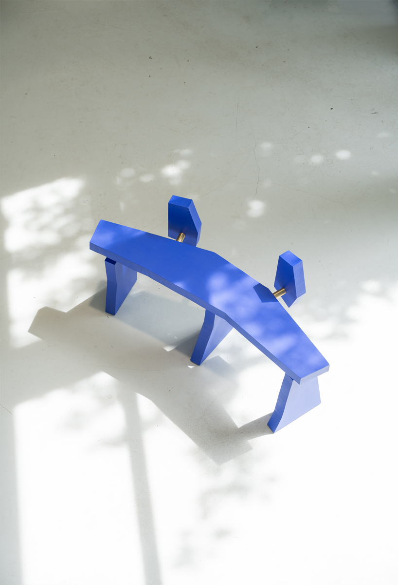 with jagged volumes painted cobalt blue, vincent decat's furniture reimagines ruins of delphi