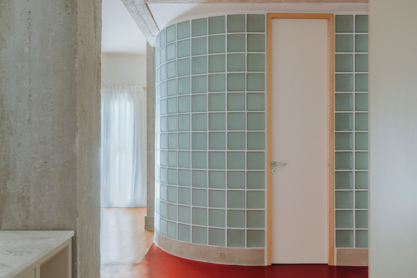 red floor runs over minimal 1970s athens apartment revamped by threshold