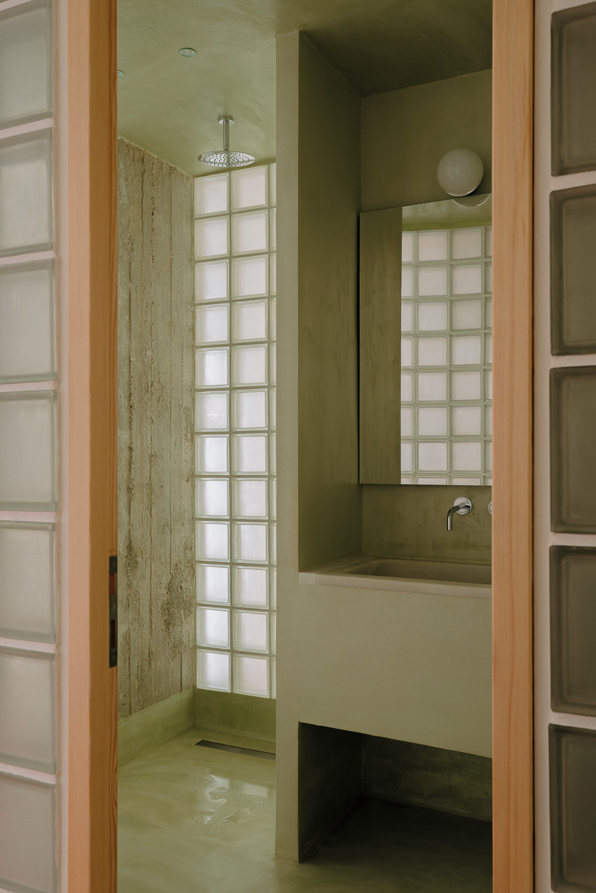 red floor runs over minimal 1970s athens apartment revamped by threshold