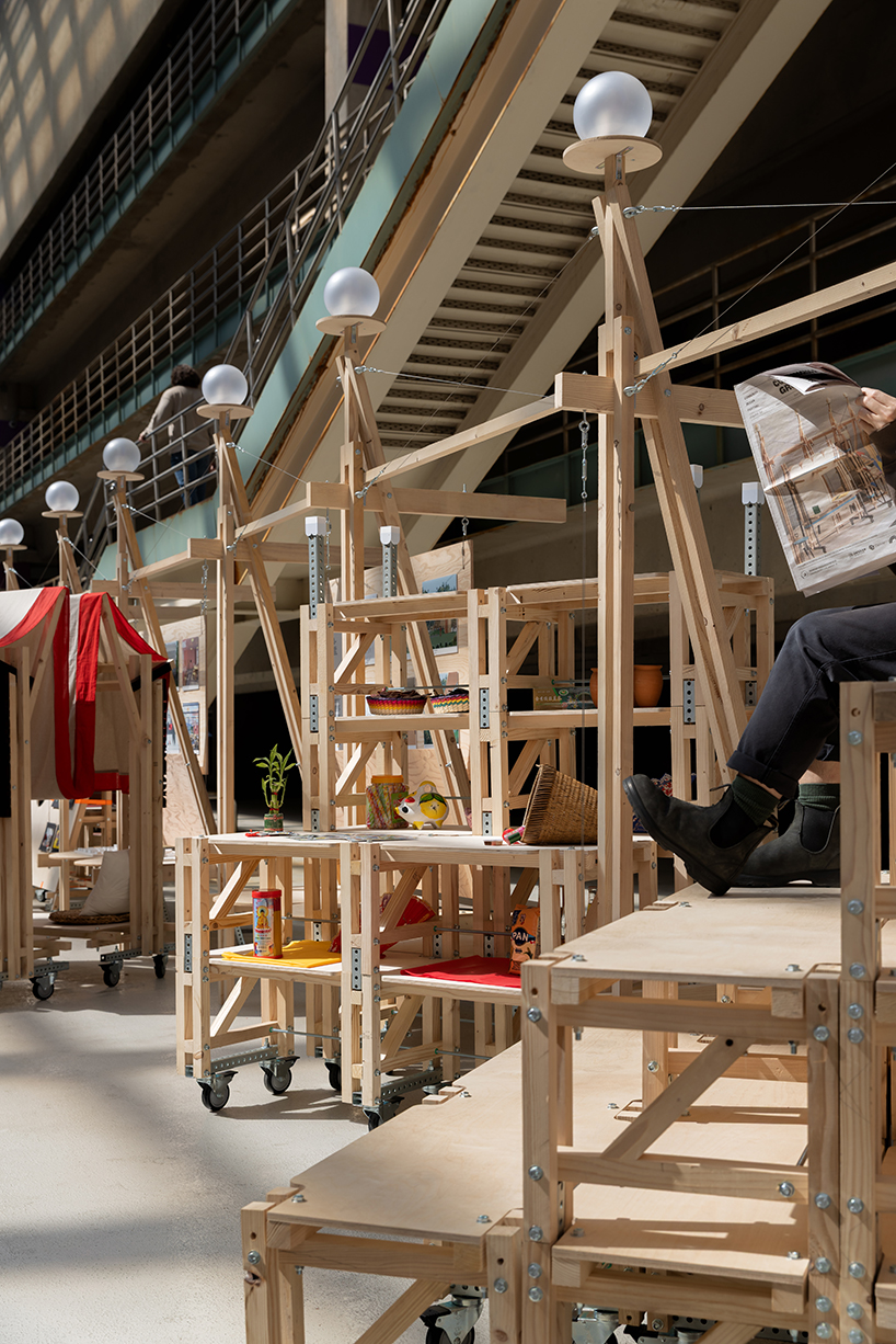 wood, ratchet straps, and metal joints shape mobile installations for design festival in denver - 1