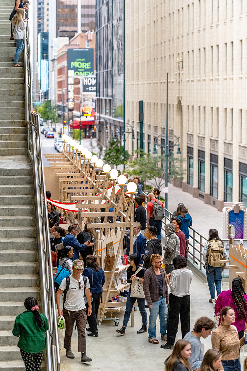 wood, ratchet straps, and metal joints shape mobile installations for design festival in denver - 2