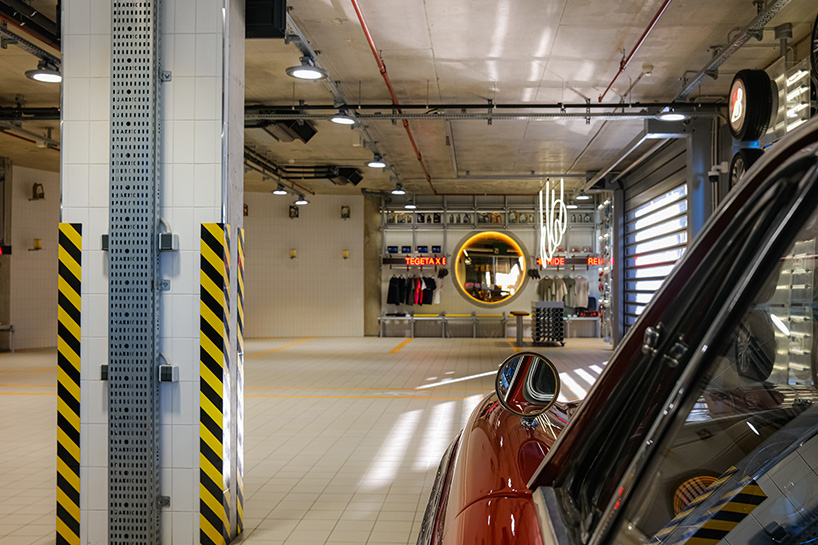 industrial kinetic displays shape hybrid exhibition and automotive service space in tbilisi - 5