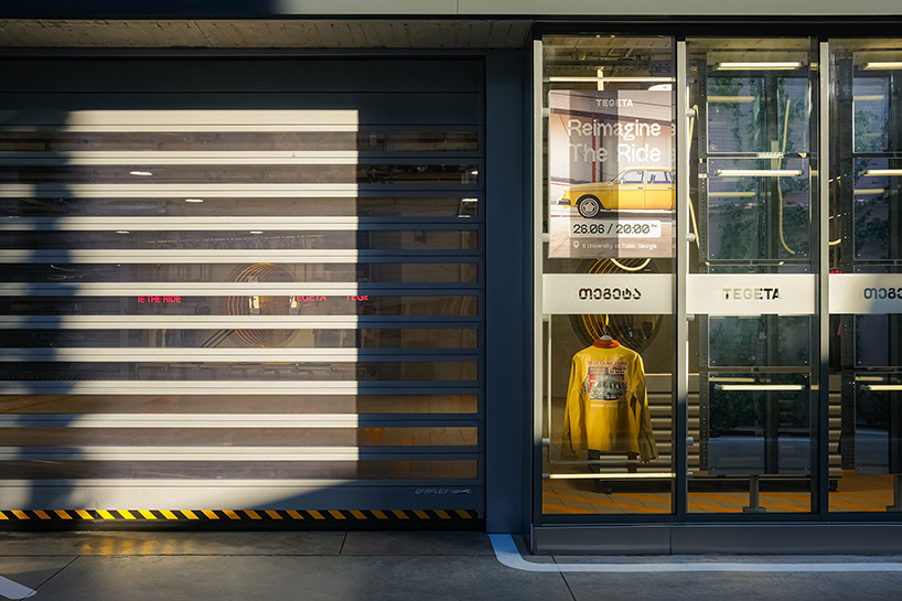 industrial kinetic displays shape hybrid exhibition and automotive service space in tbilisi - 7