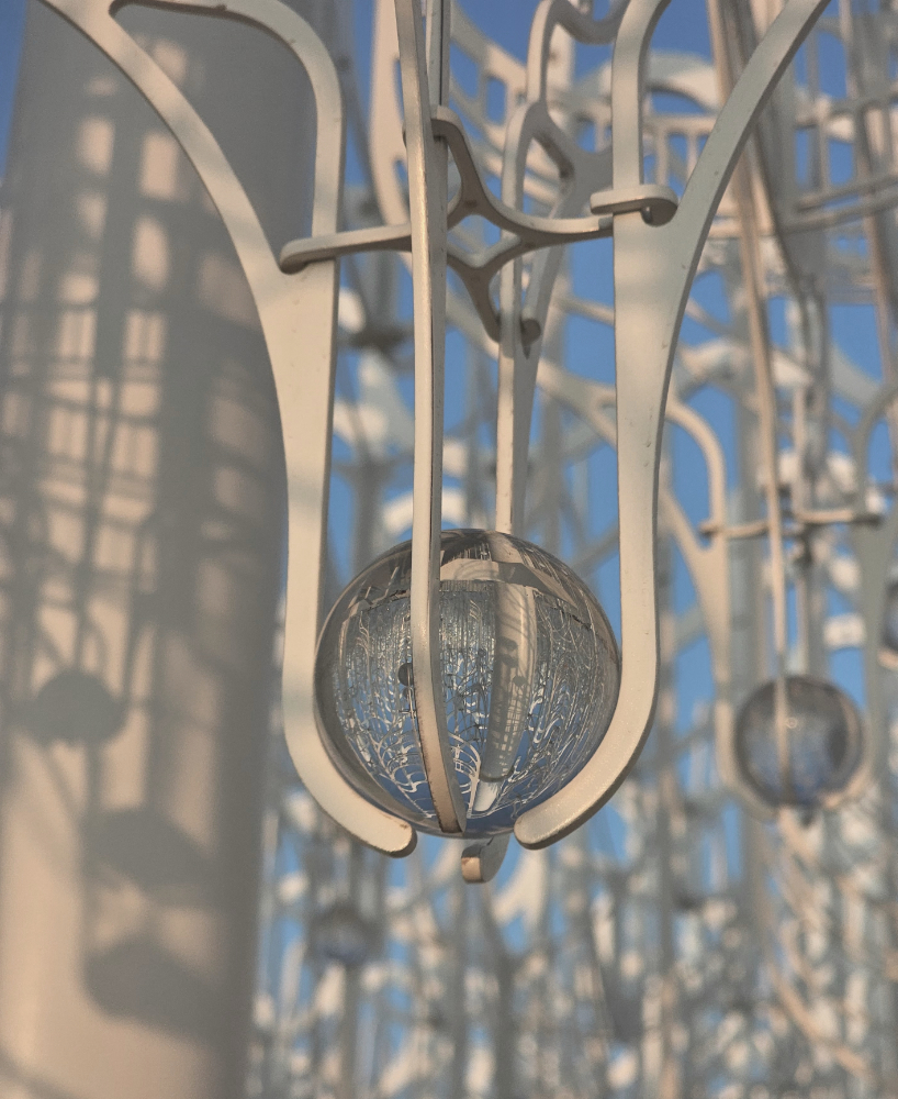 cloud-like white canopy of hanging vines emerges from abu dhabi&rsquo;s arid landscape