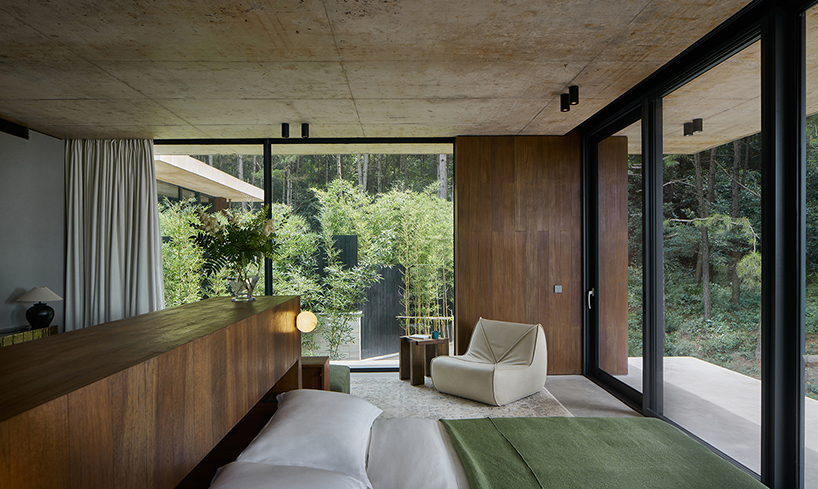 studio8's resort villas nestle amid pine forests and bamboo mountains in china