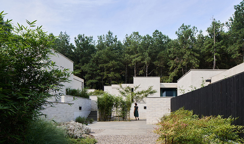 studio8's resort villas nestle amid pine forests and bamboo mountains in china