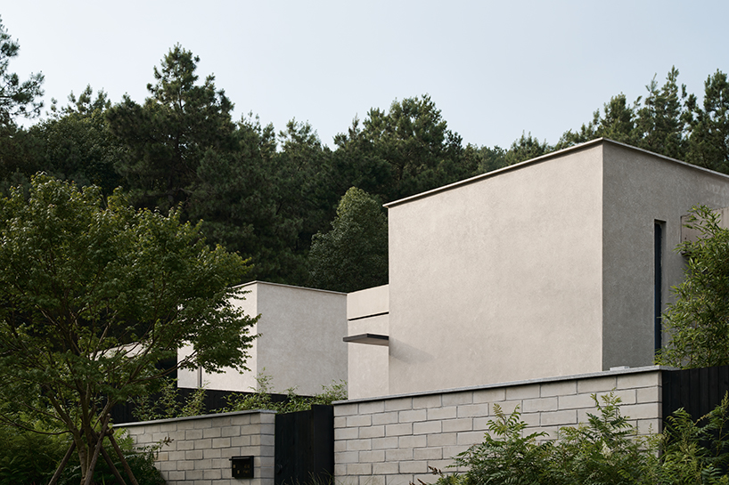 studio8's resort villas nestle amid pine forests and bamboo mountains in china