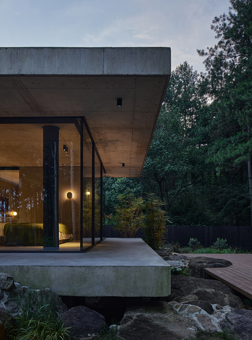 studio8's resort villas nestle amid pine forests and bamboo mountains in china