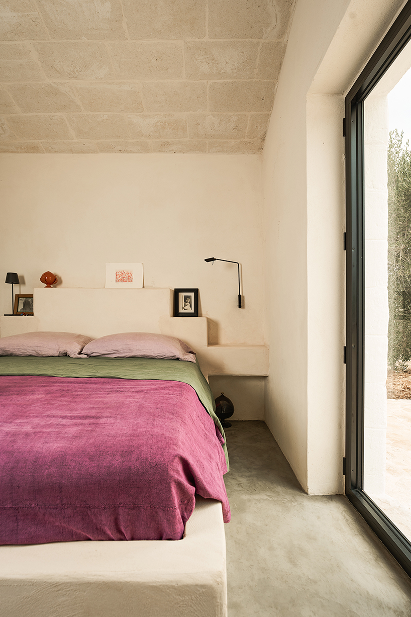 three traditional stone-domed trulli fuse with contemporary residence by studio8 in italy