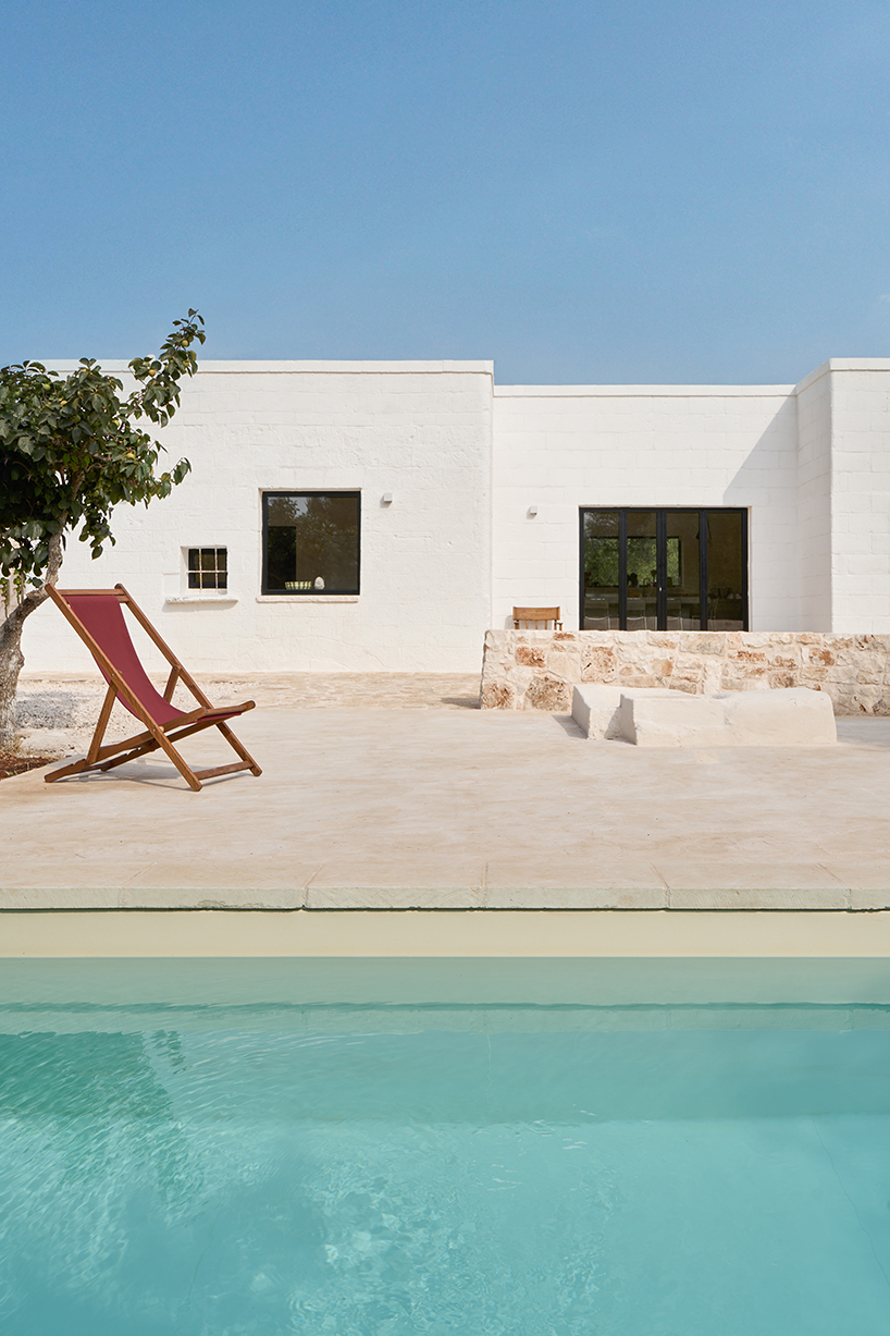 three traditional stone-domed trulli fuse with contemporary residence by studio8 in italy