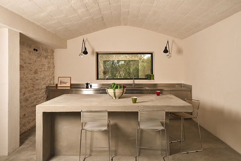 three traditional stone-domed trulli fuse with contemporary residence by studio8 in italy