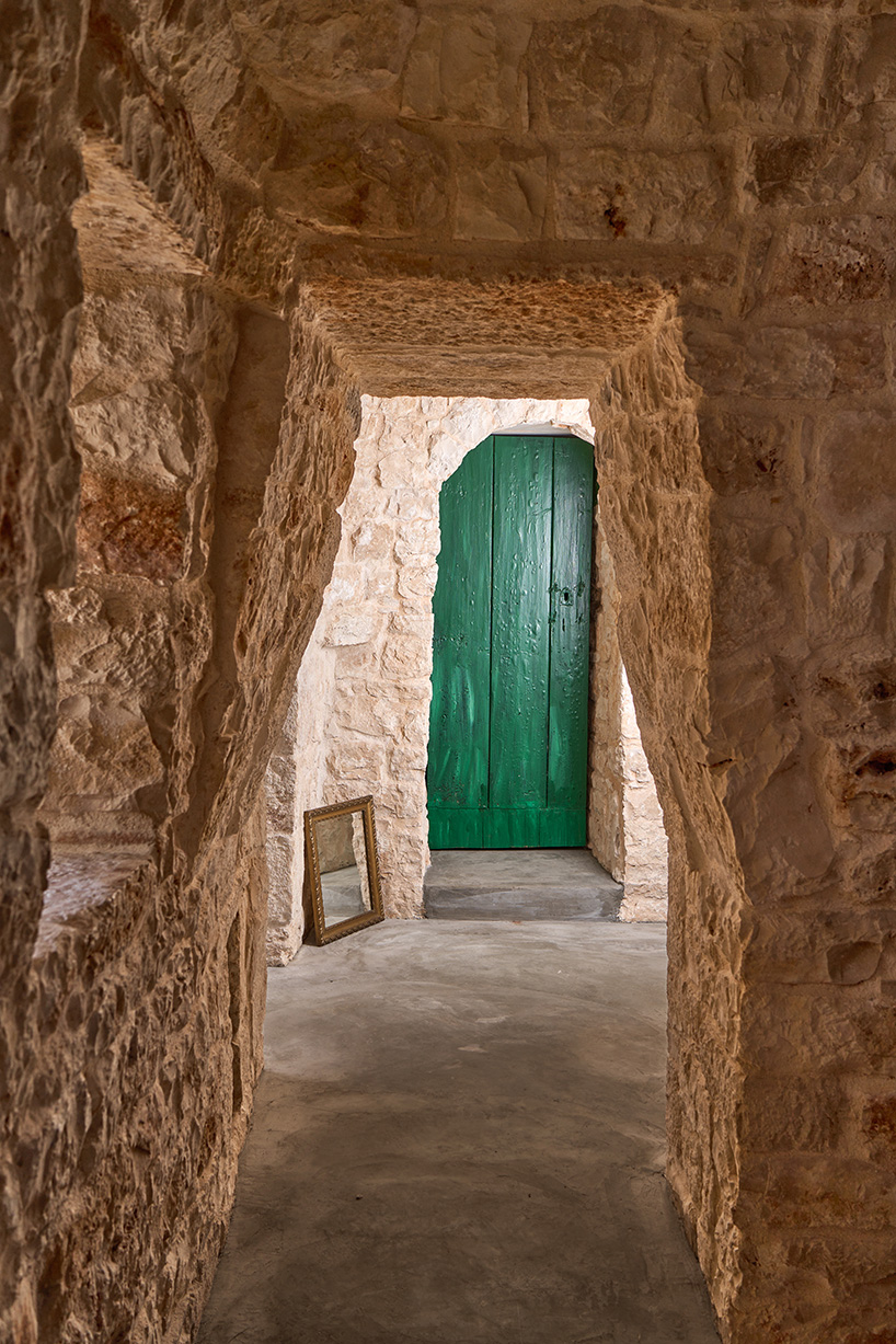 three traditional stone-domed trulli fuse with contemporary residence by studio8 in italy