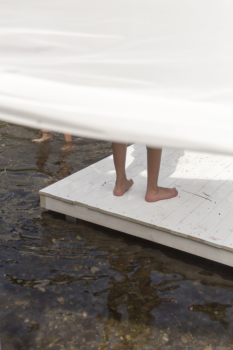 ephemeral circle textile installation by atelier VRAC activates mountain river in romania