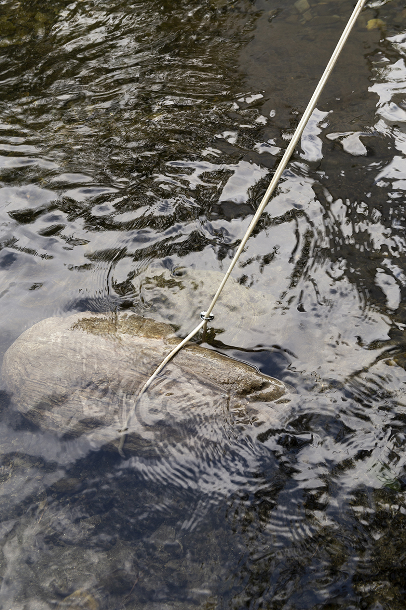 ephemeral circle textile installation by atelier VRAC activates mountain river in romania
