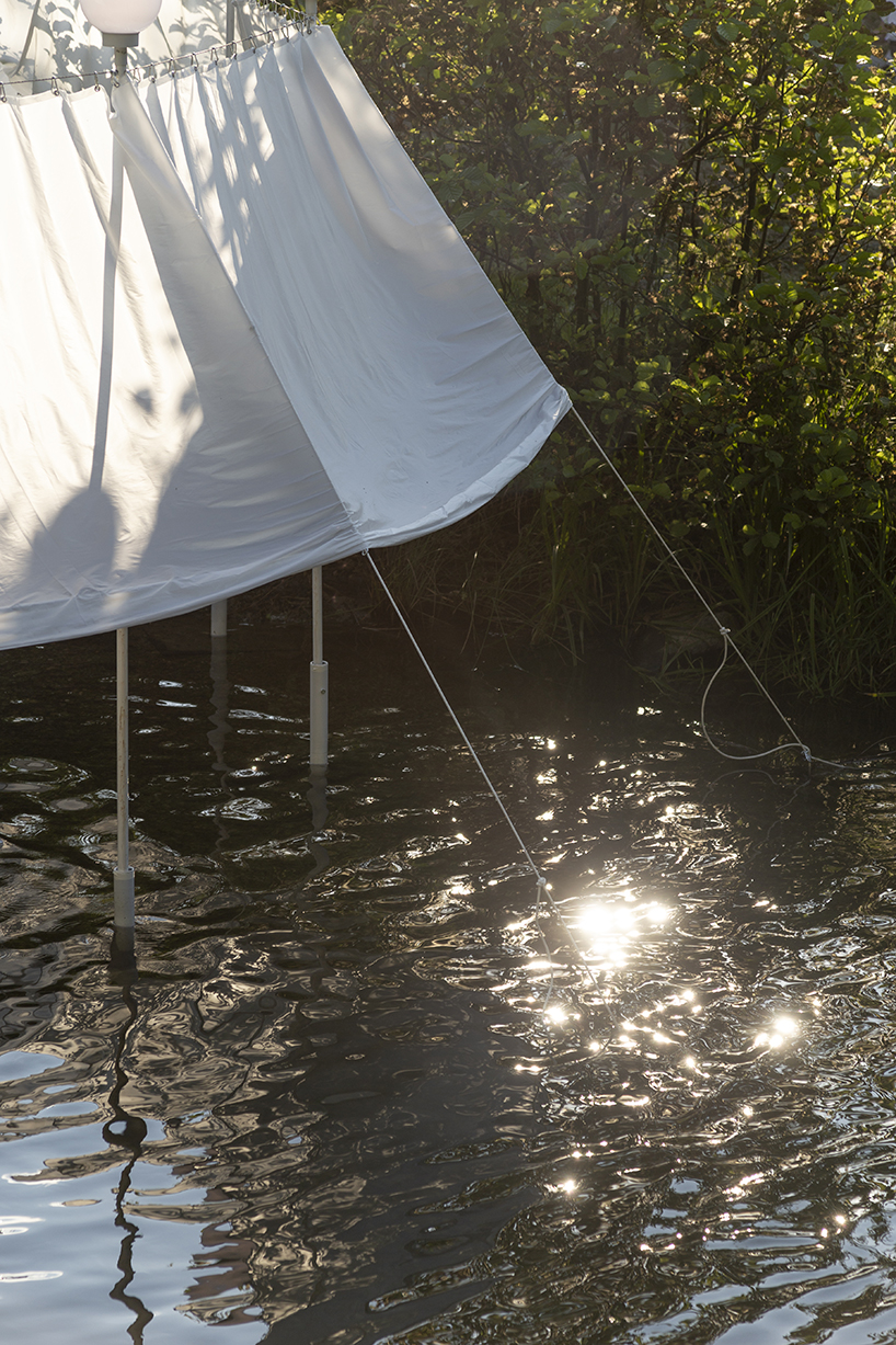 ephemeral circle textile installation by atelier VRAC activates mountain river in romania