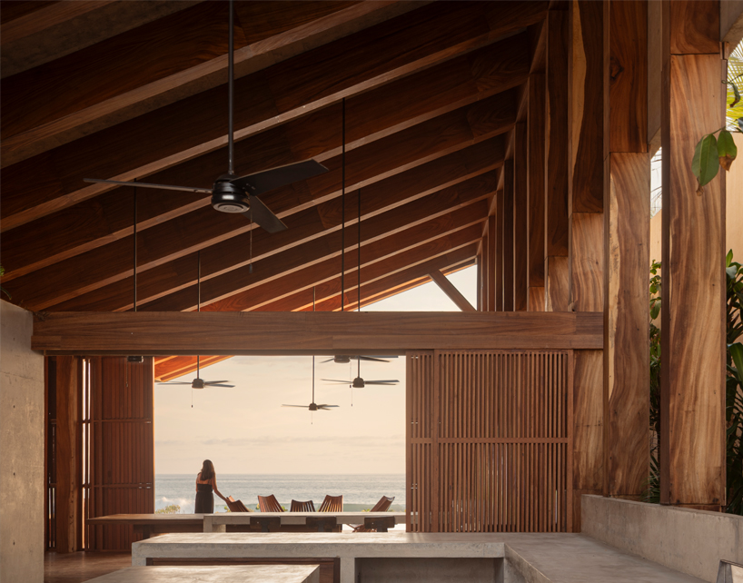 wood and concrete volumes form seaside retreat by taller alberto calleja / TAC in mexico