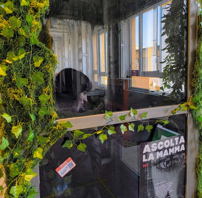 AI voice agent embeds within moss-covered phone booth at milan design week