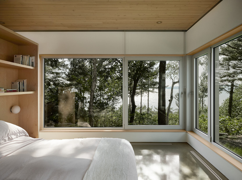 atelier pierre thibault introduces skylights to 1960s A-frame quebec residence clad in wood