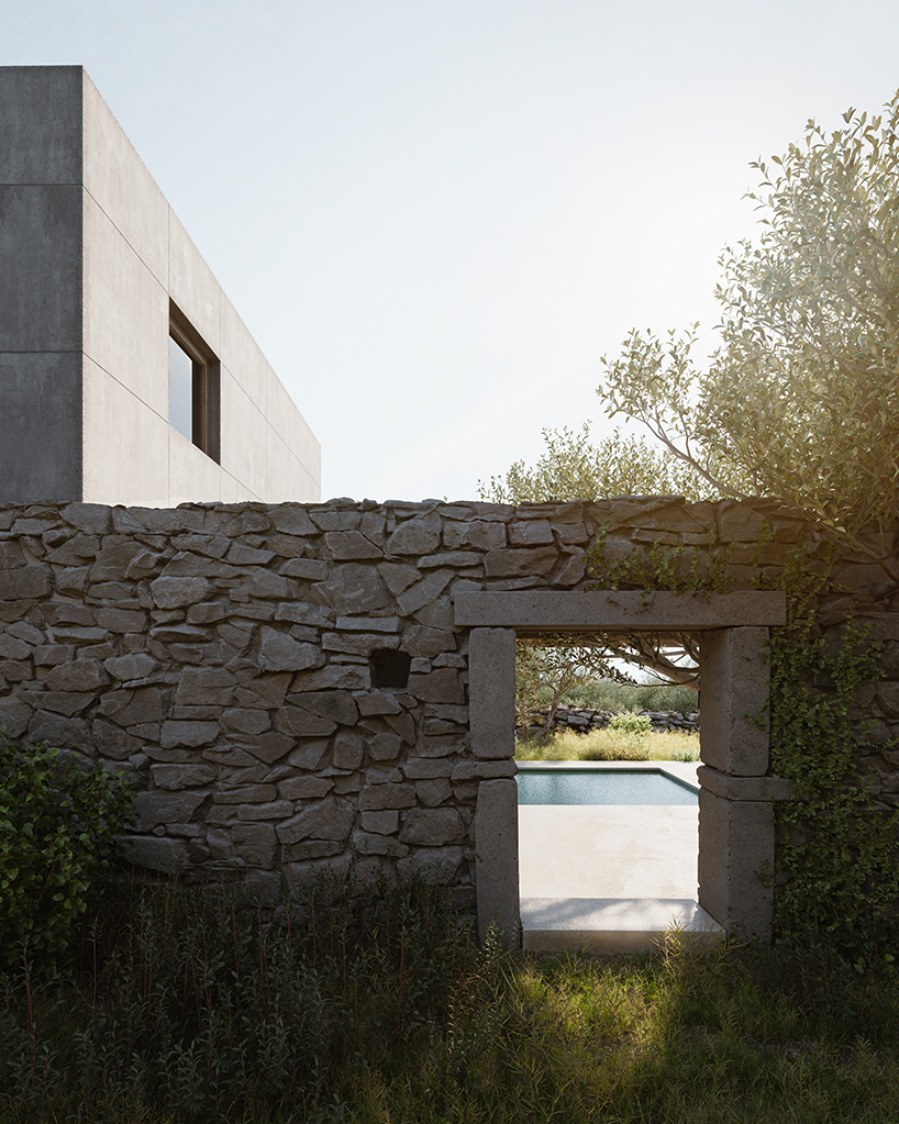 rough stone textures interplay with smooth gray cement for enigma project in paxos island