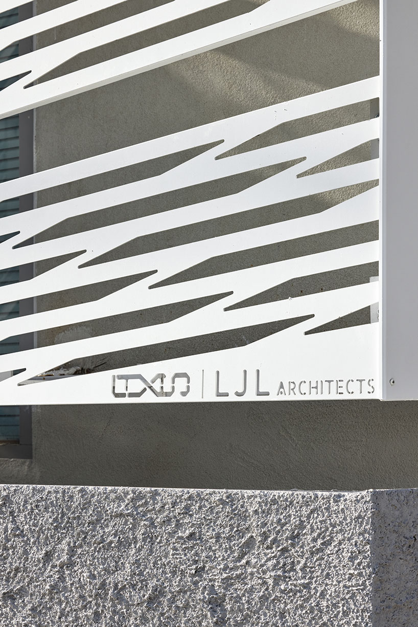 perforated metal panels reframe building's exterior into responsive facade system in seoul