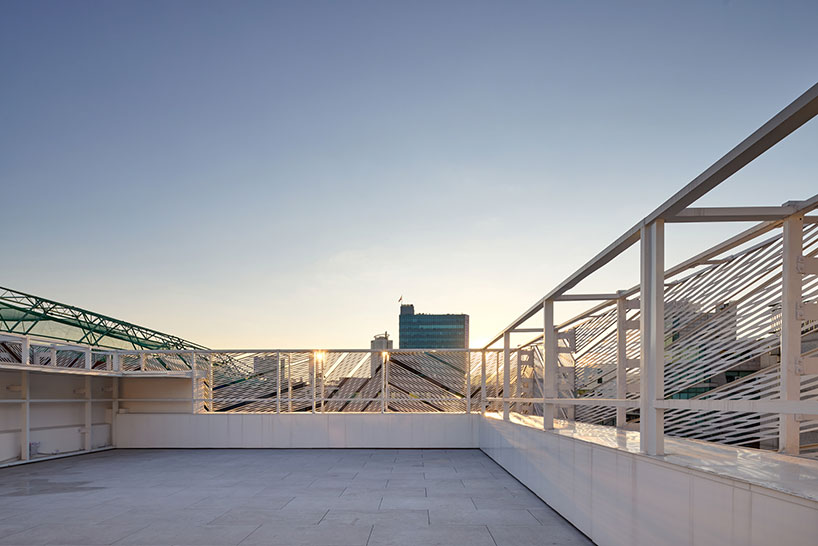 perforated metal panels reframe building's exterior into responsive facade system in seoul