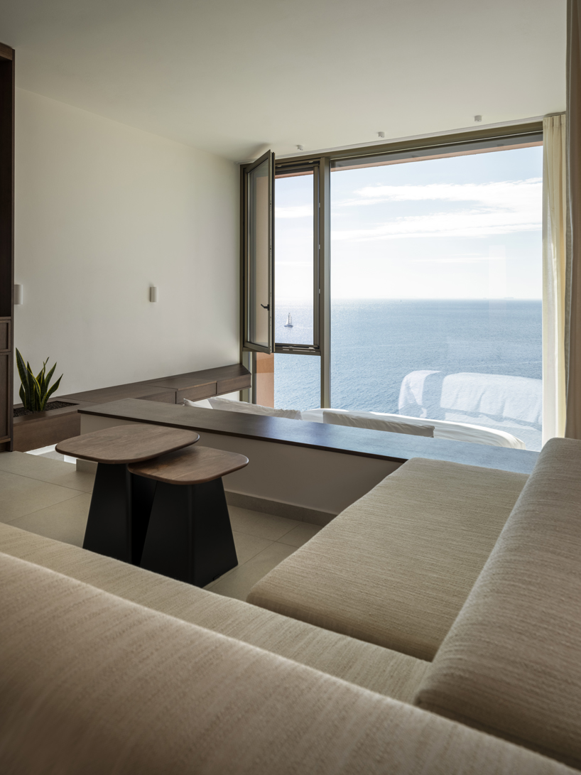 olen resort embeds into greek island slope across three terraced levels - 13