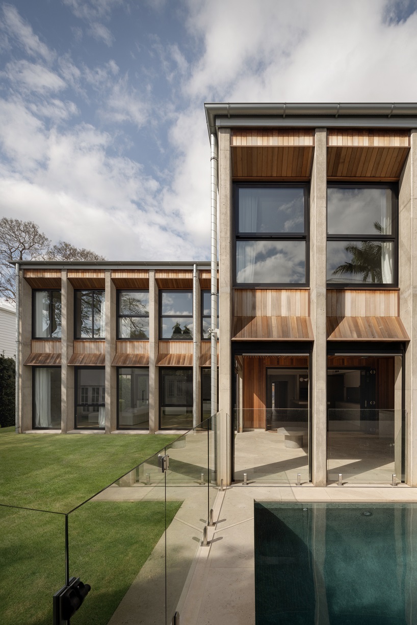 bold concrete frame by george kouparitsas reshapes pre-war cottage's facade in australia