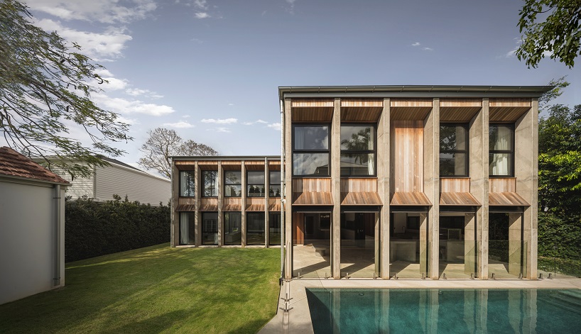 bold concrete frame by george kouparitsas reshapes pre-war cottage's facade in australia