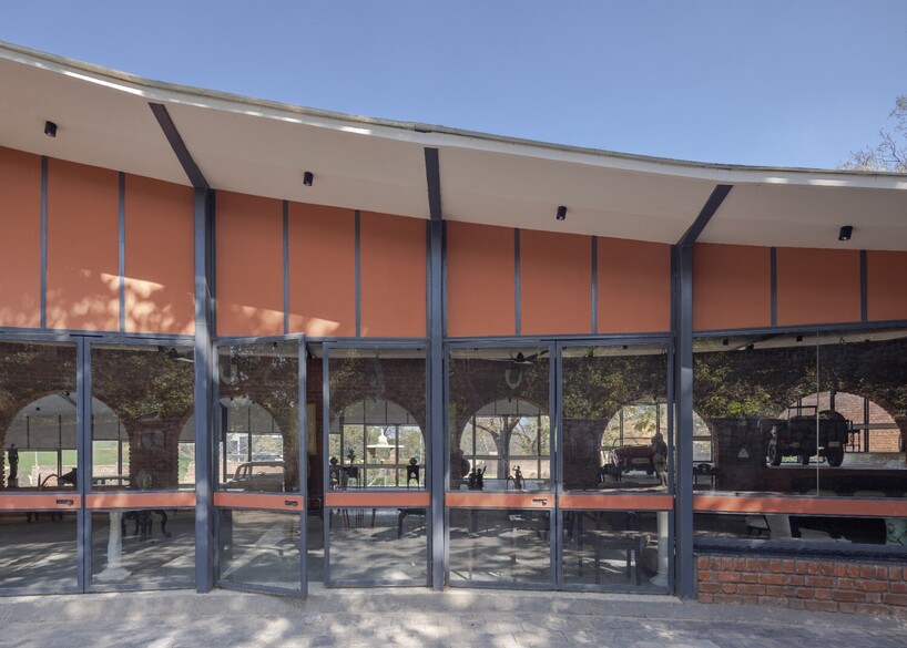 curved canopy shelters stepped house-gallery hybrid by milind shivani in india