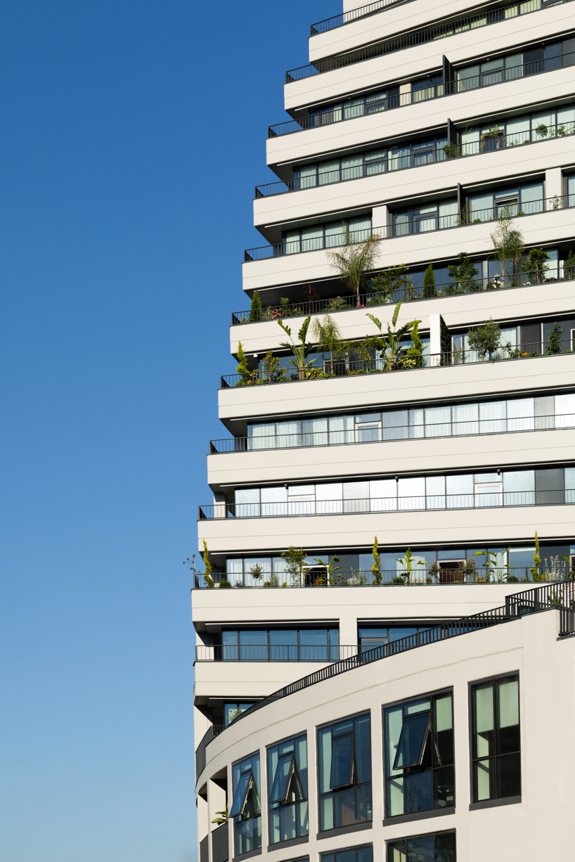 JA joubert architecture sculpts undulating lakefront district following sloped terrain in tirana