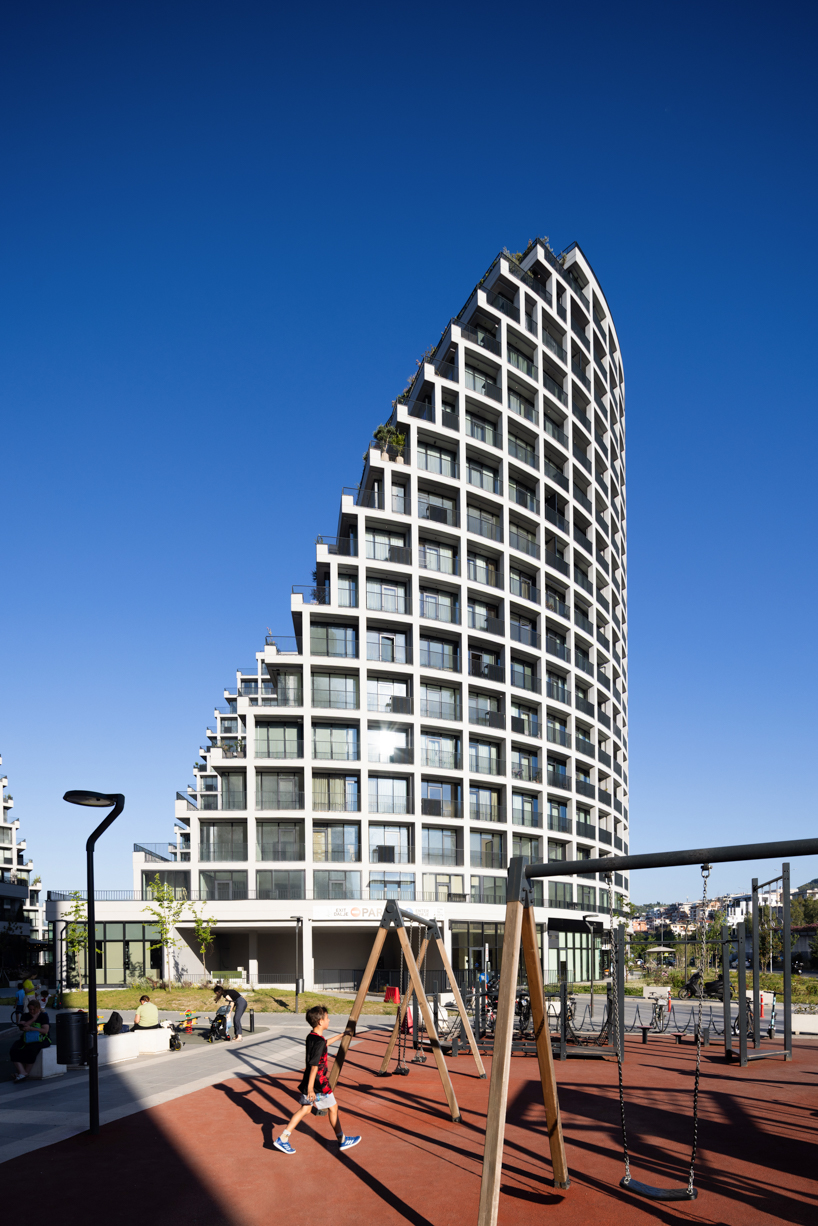 JA joubert architecture sculpts undulating lakefront district following sloped terrain in tirana