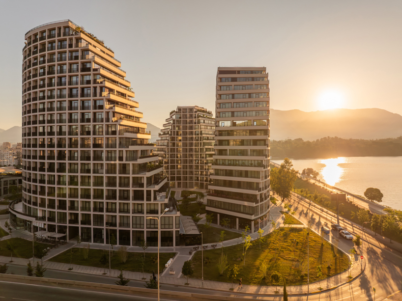 JA joubert architecture sculpts undulating lakefront district following sloped terrain in tirana